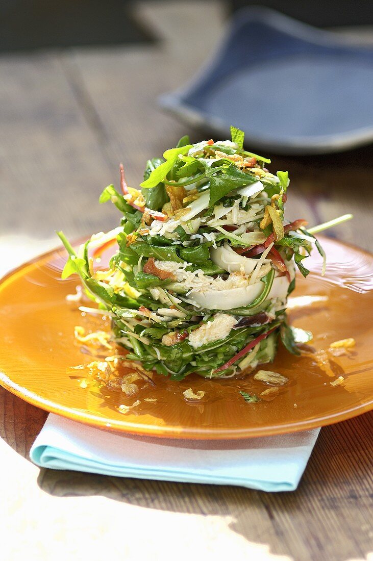Rocket salad with crabmeat and coconut