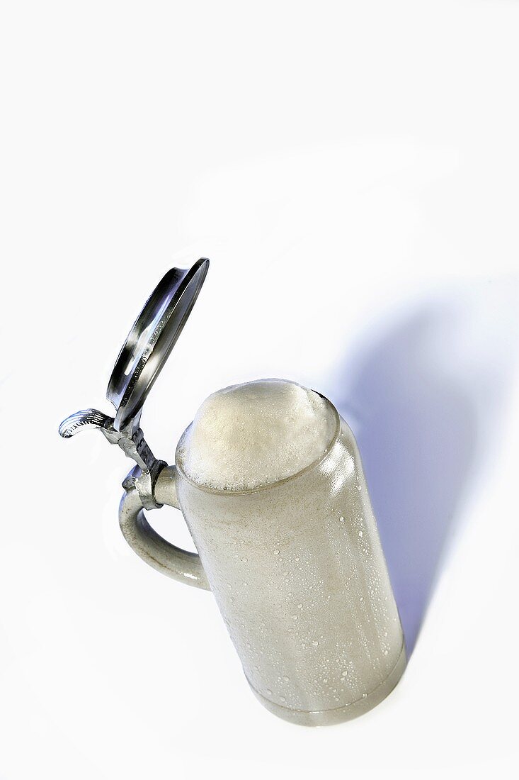 Beer in tankard with lid