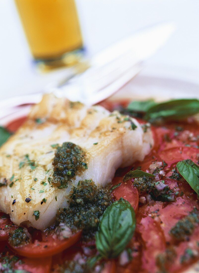 Fried cod on tomato carpaccio