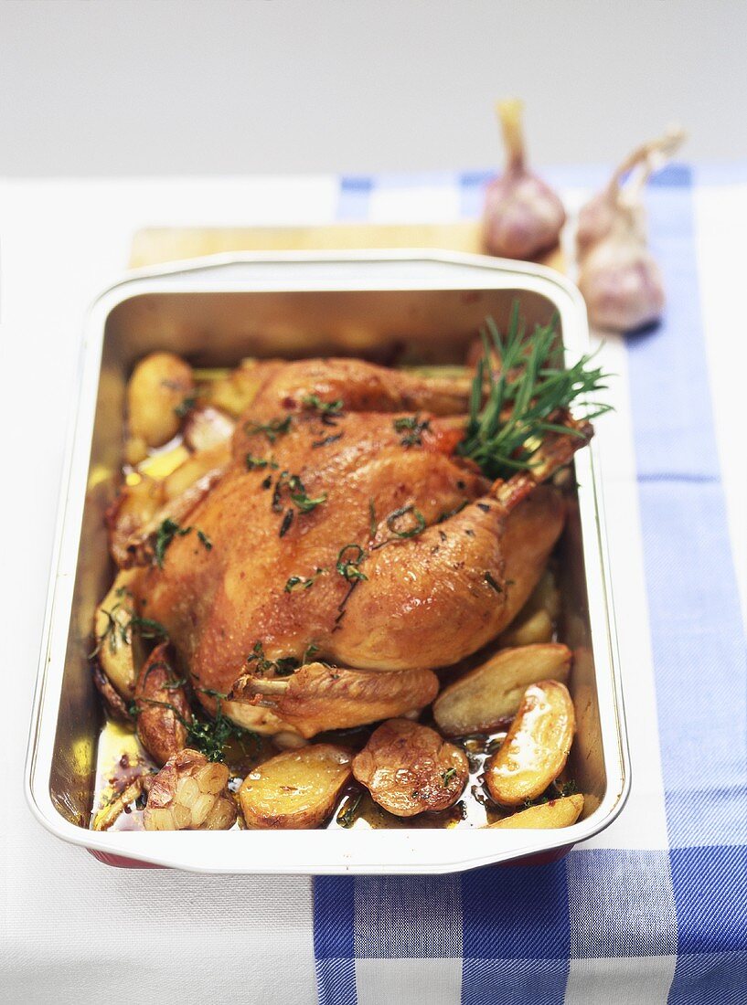 Garlic chicken with rosemary and potatoes