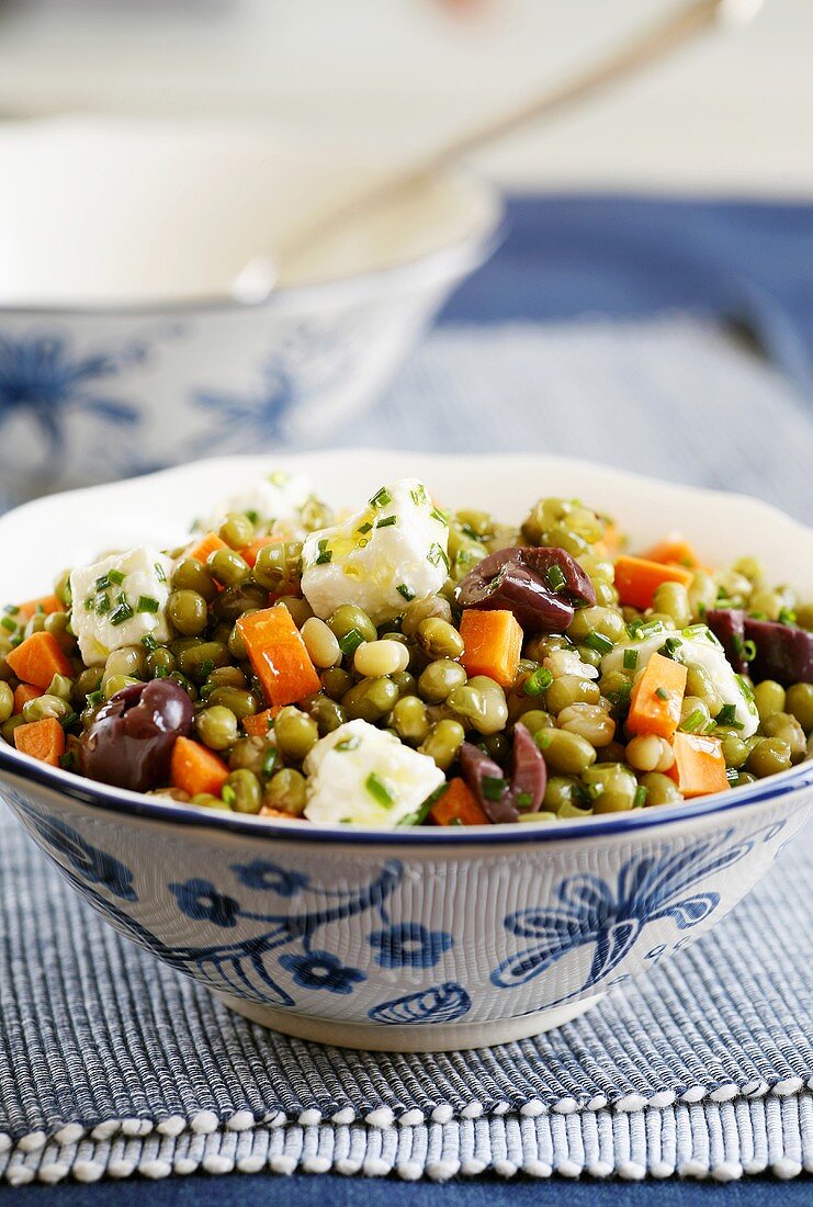 Pea and carrot salad with feta and olives