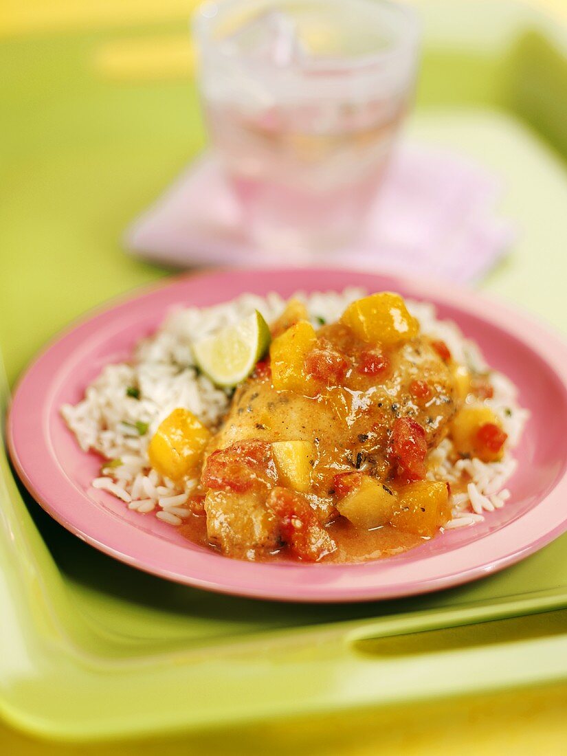 Chicken breast with mango salsa and rice