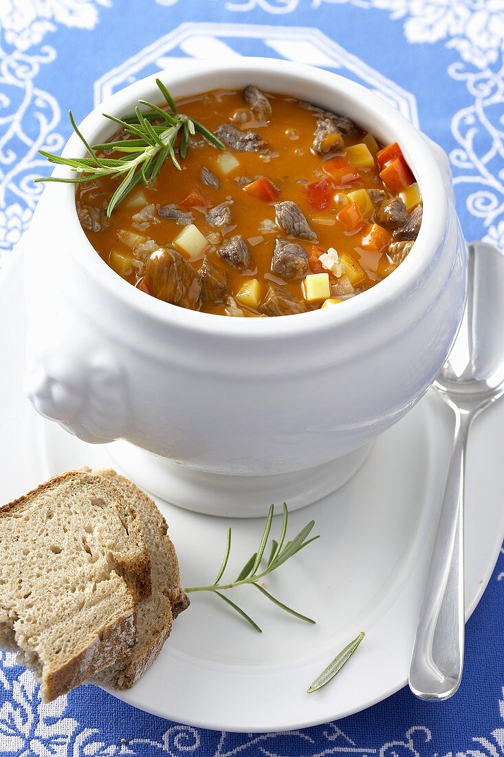 Spicy goulash soup with bread