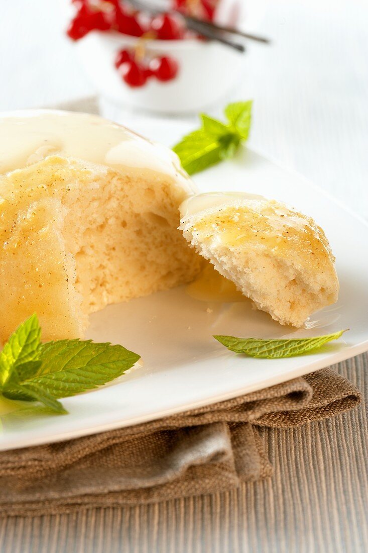 Dumpling cake (Dampfnudel) with vanilla sauce