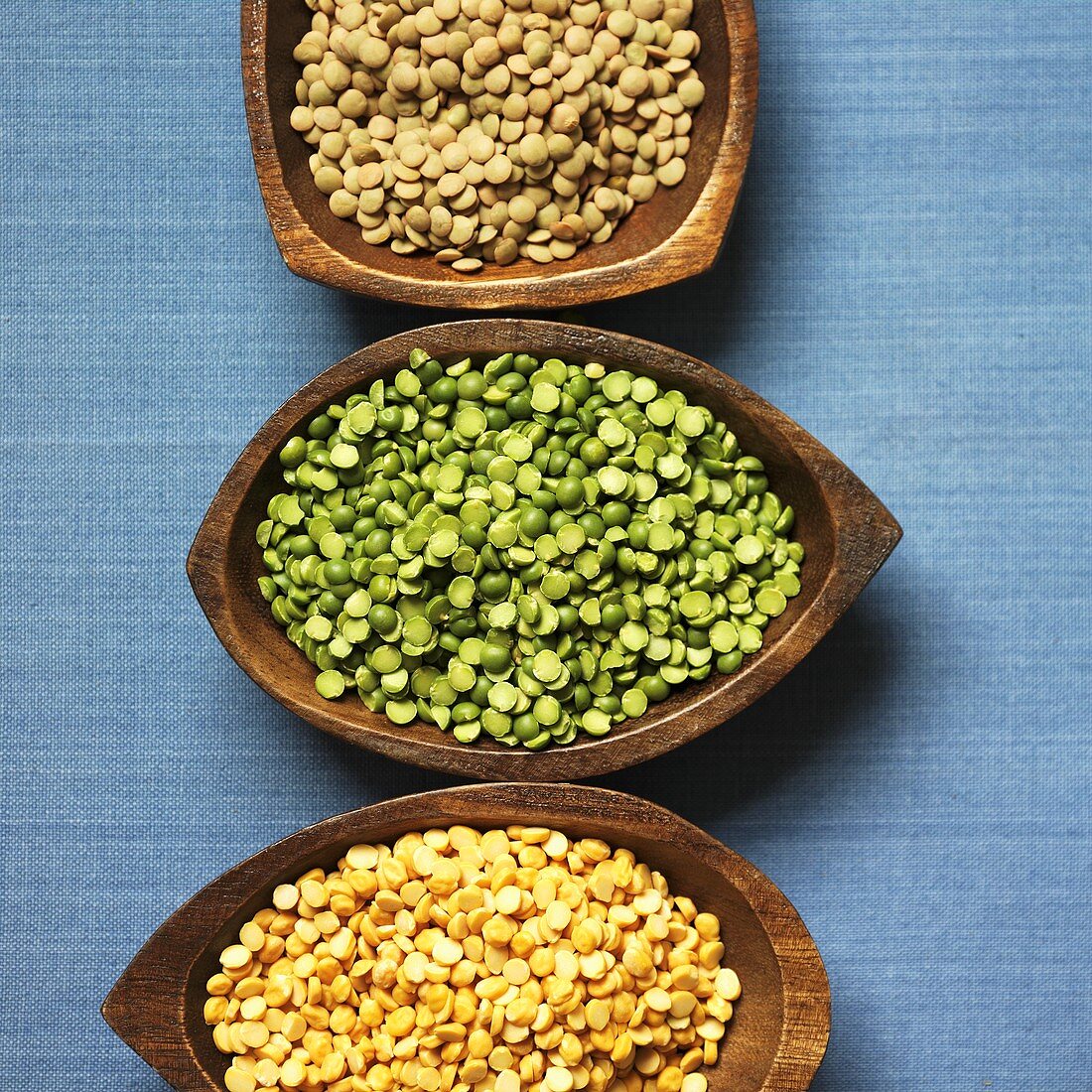 Three types of lentils in bowls
