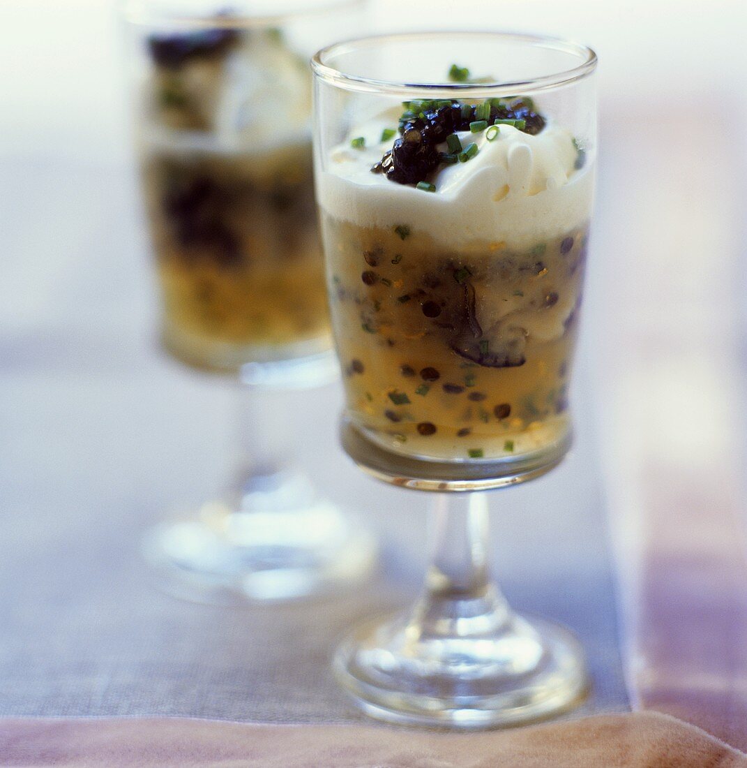Oysters and caviar in jelly with sour cream