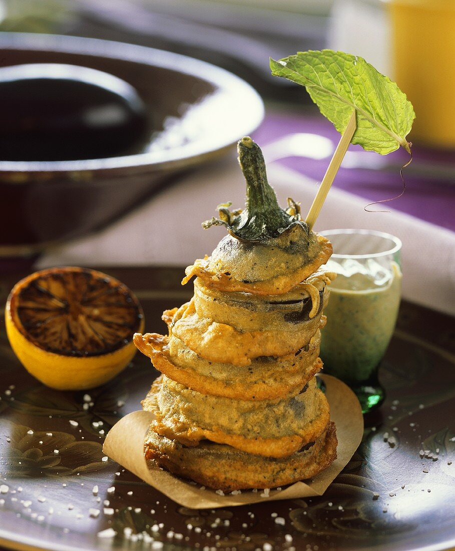 Tower of battered aubergine slices