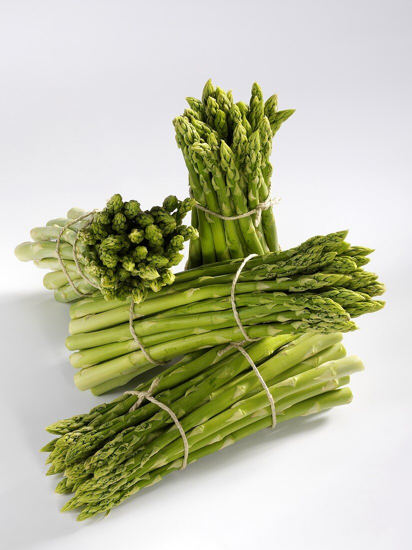 Four bundles of green asparagus