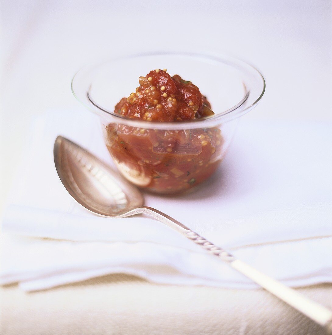 Tomato sauce in small glass bowl