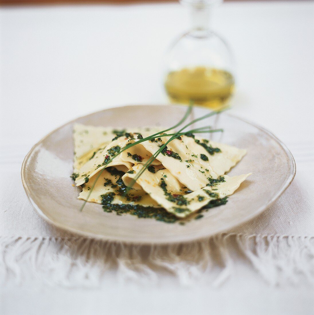 Ravioli with herb oil