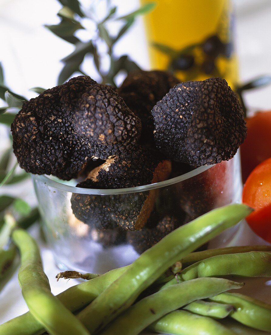Black summer truffles in a glass bowl