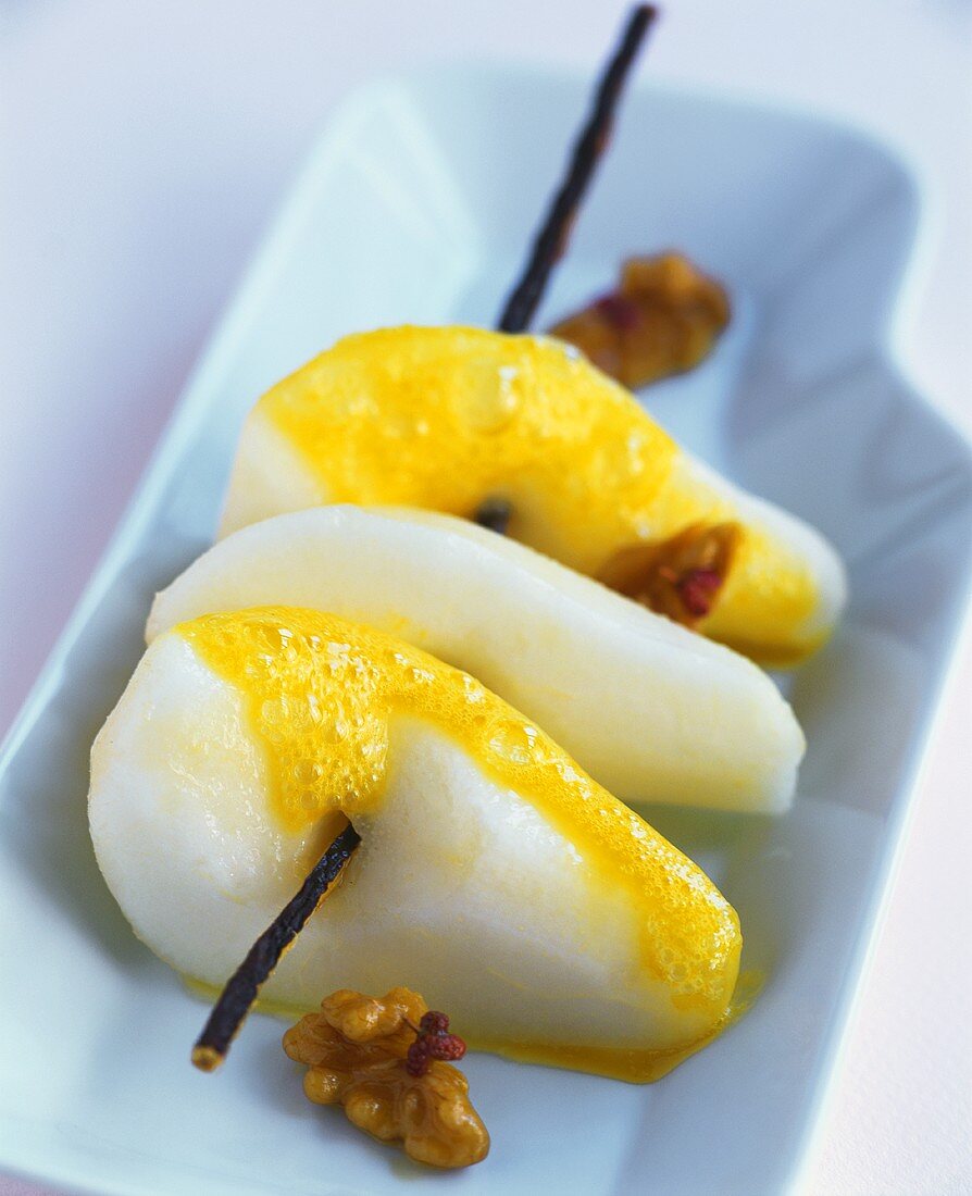Poached pears with honey foam