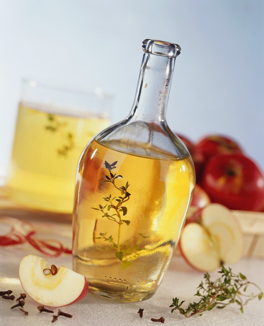 Apple vinegar with thyme in a bottle