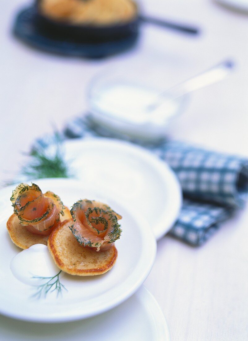 Blinis with marinated salmon and sour cream