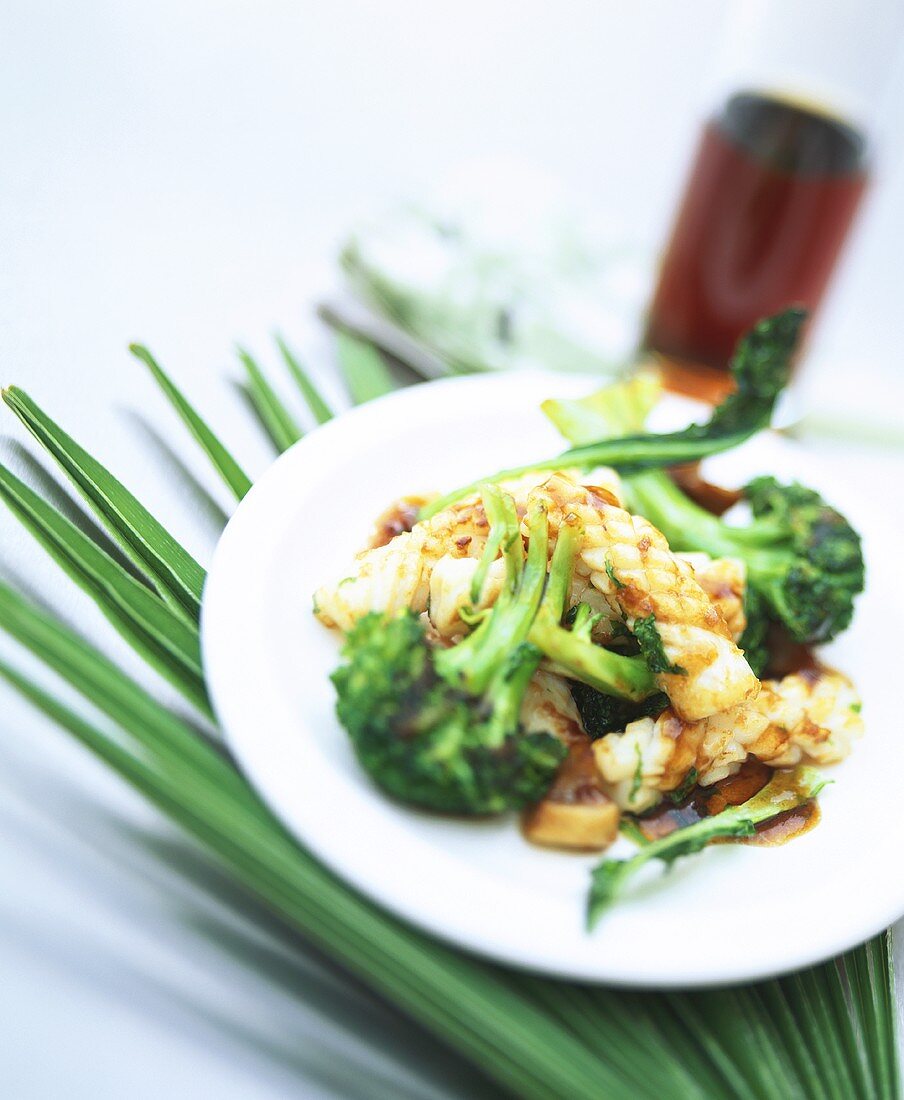 Squid with fried broccoli and mushrooms