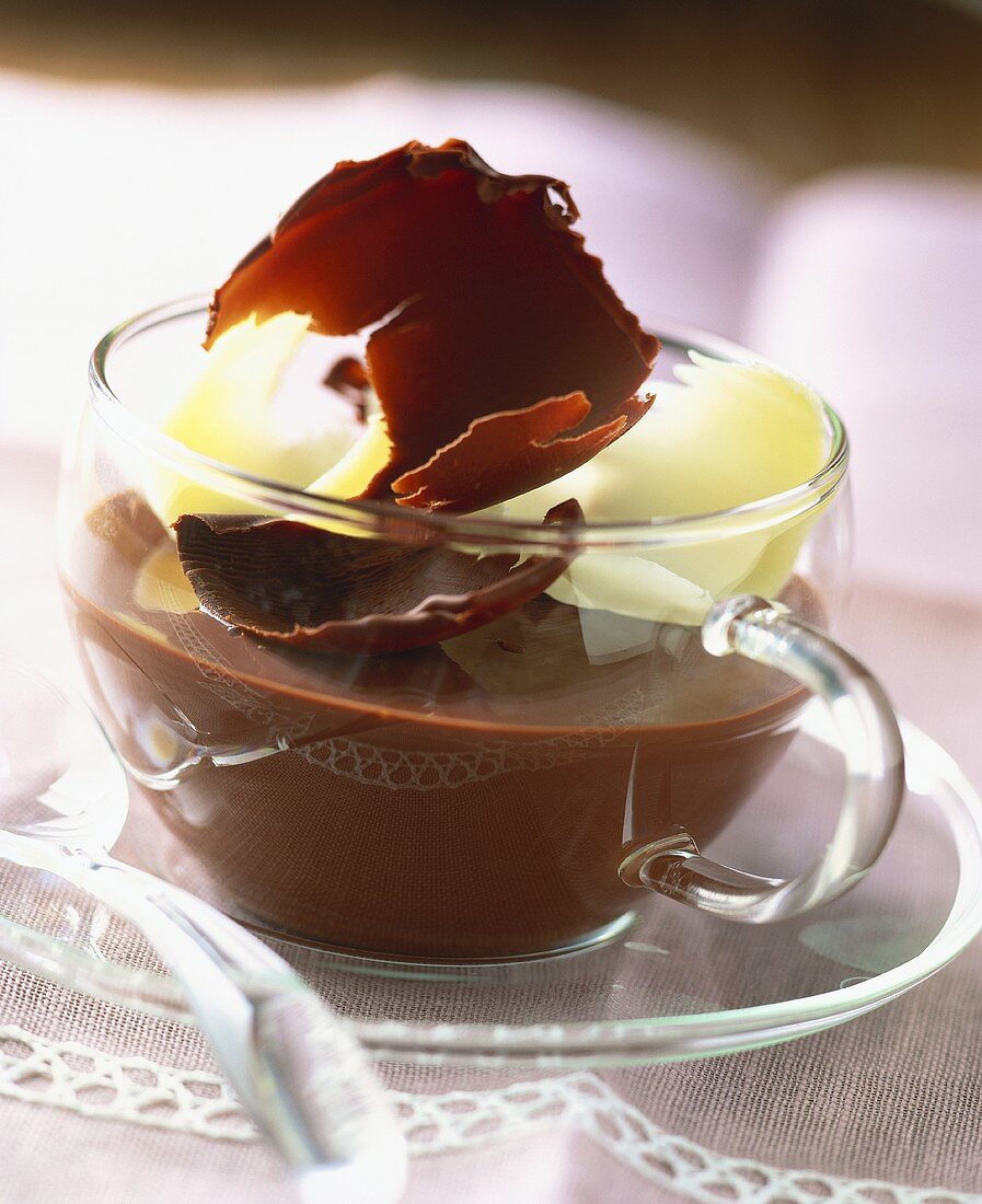Chocolate dessert with brown and white chocolate curls