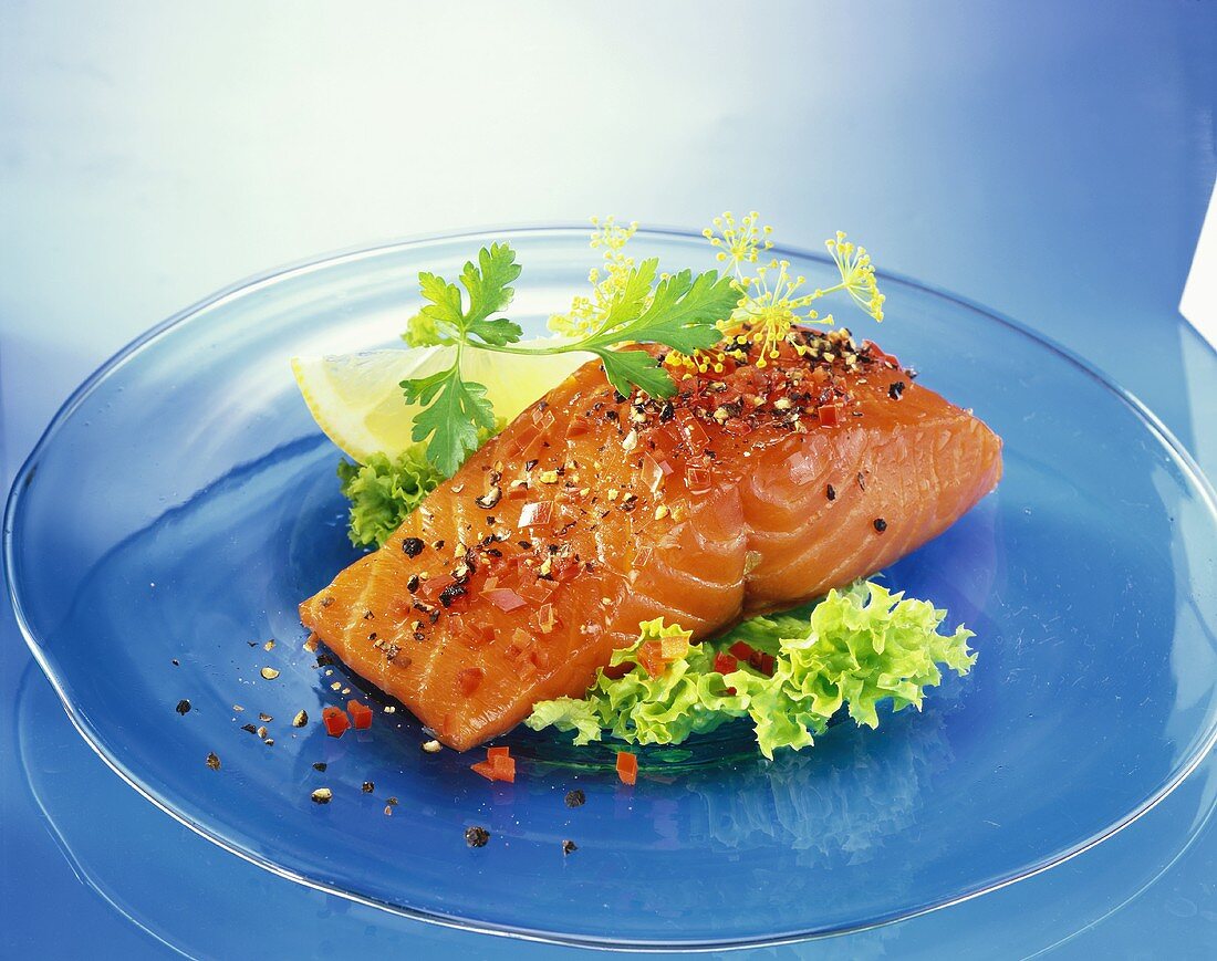 Smoked salmon fillet with salad garnish