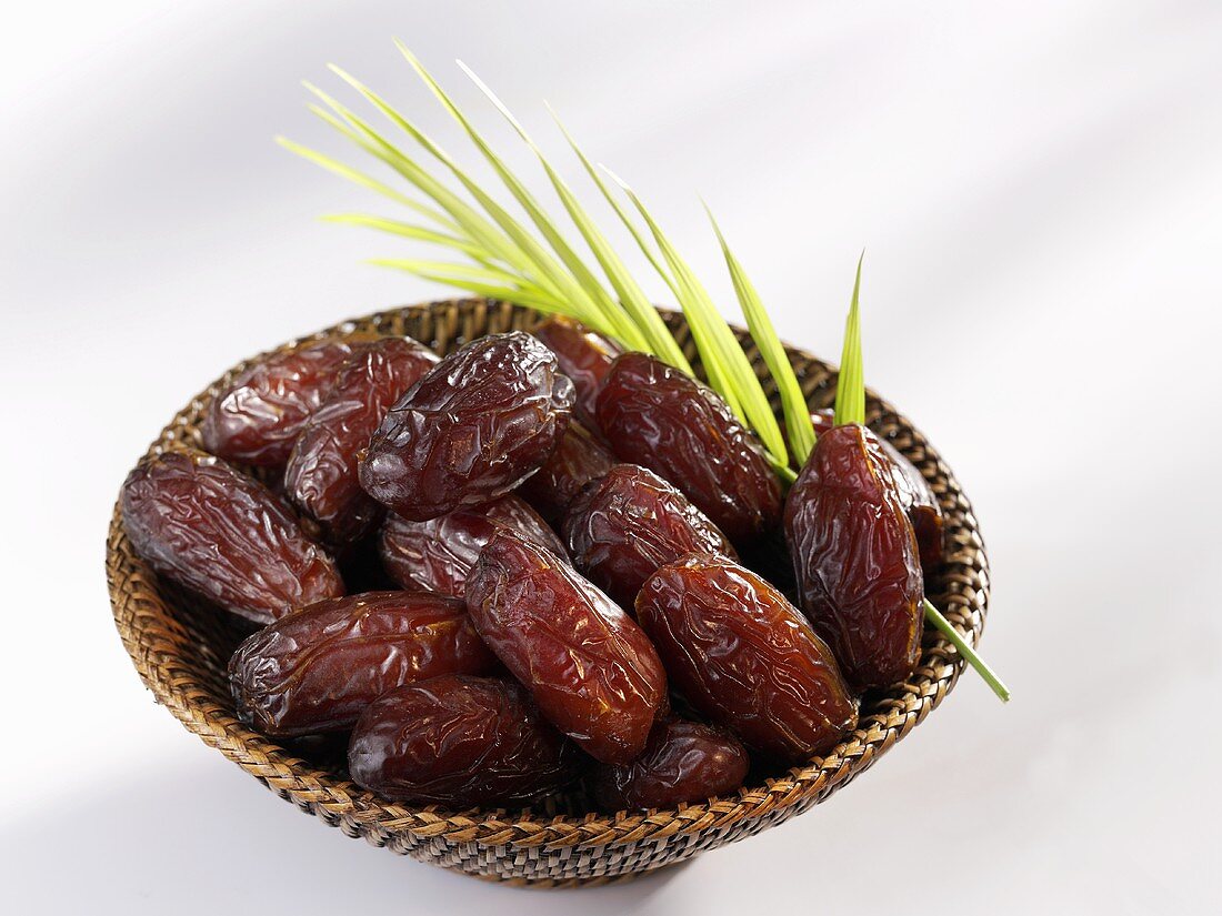 Dried dates in a small basket