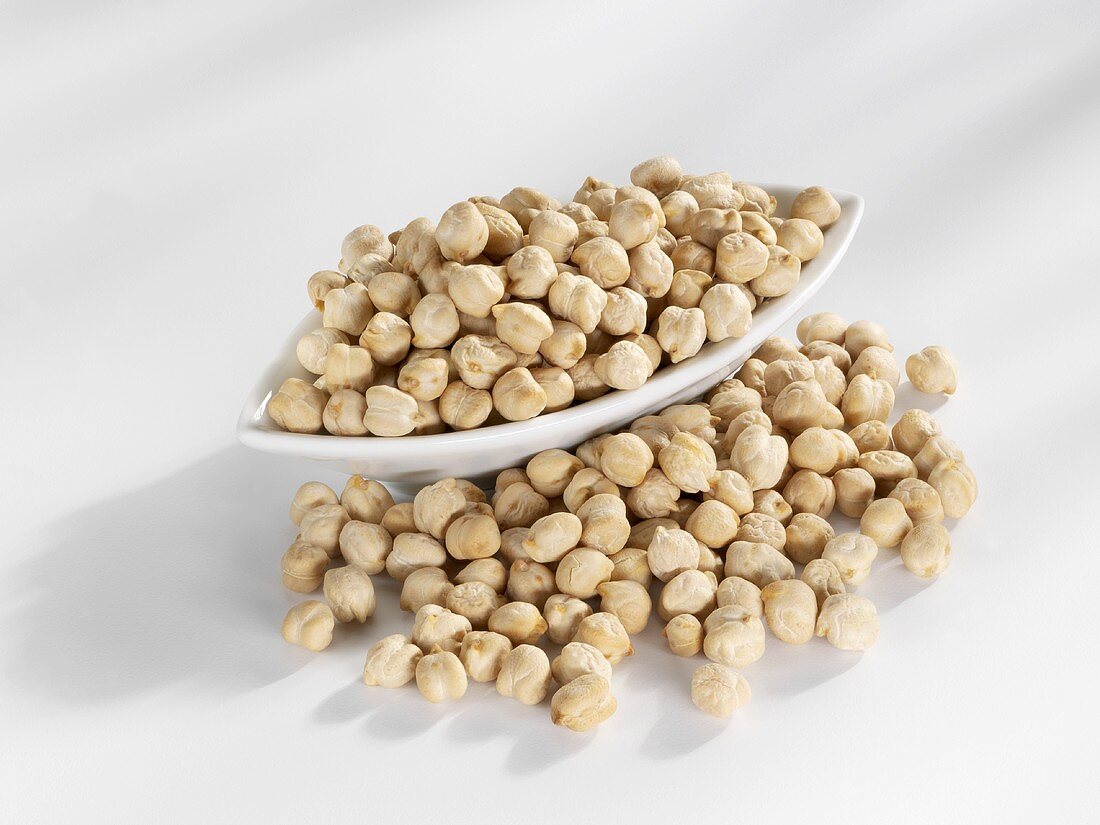 Chick-peas in and in front of a bowl