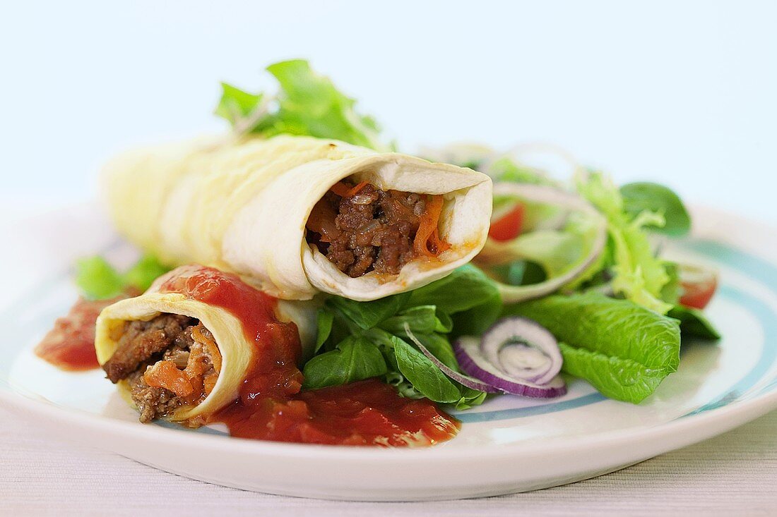 Wrap with mince filling and spicy sauce