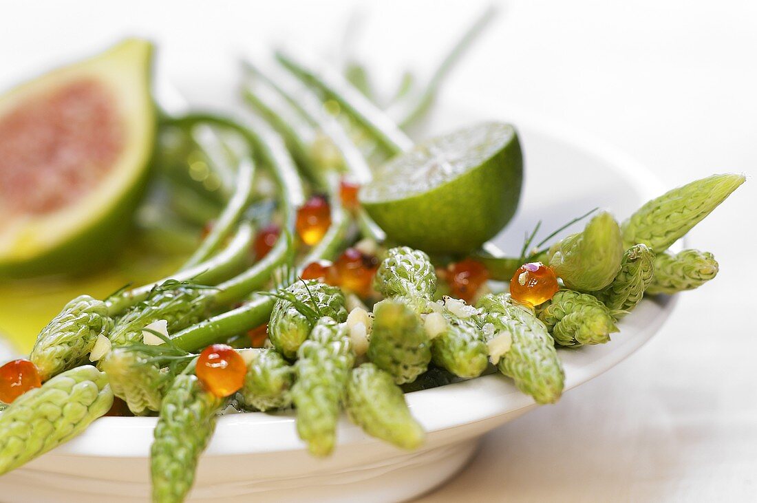 Hop asparagus with salmon caviar and fig