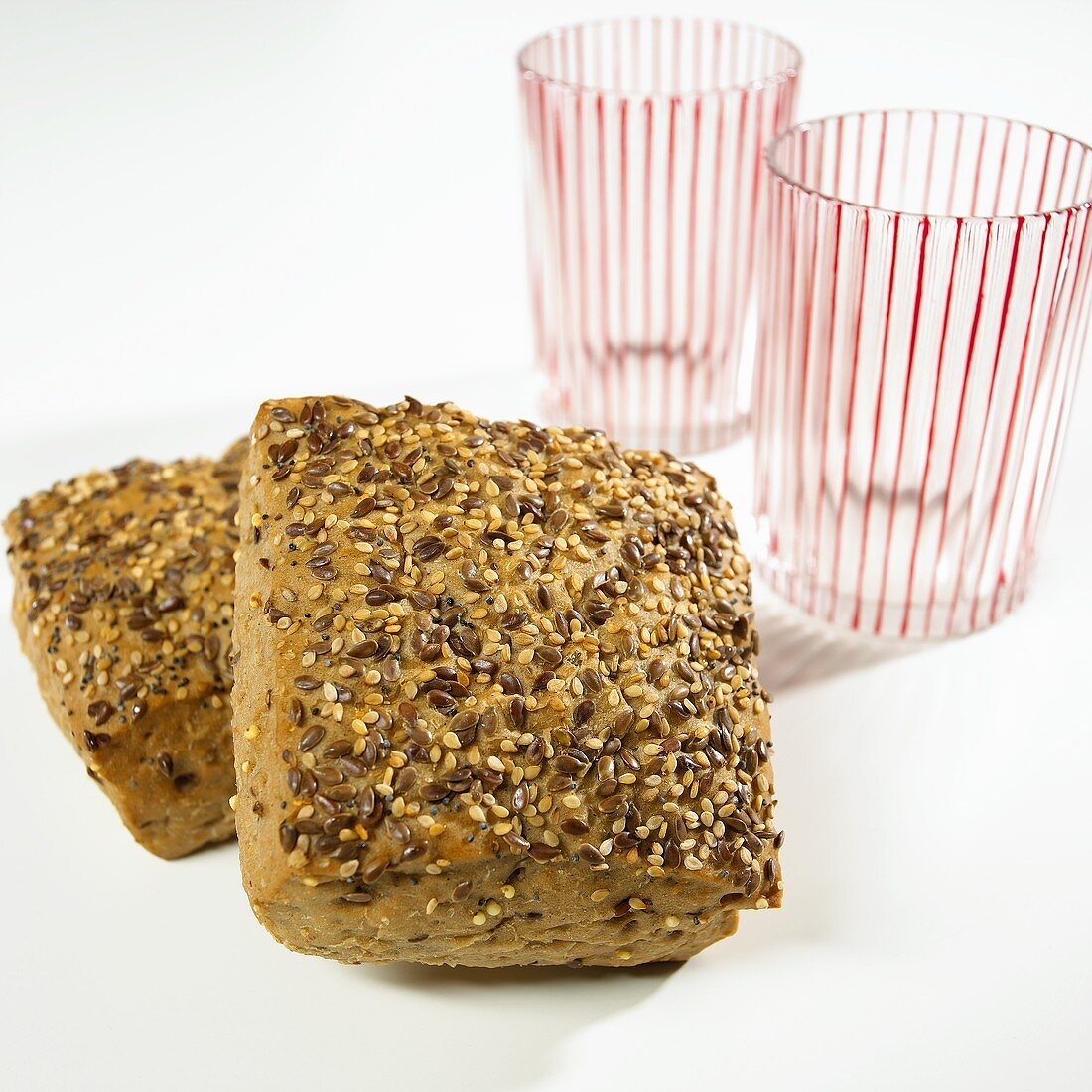 Two wholemeal rolls and two glasses