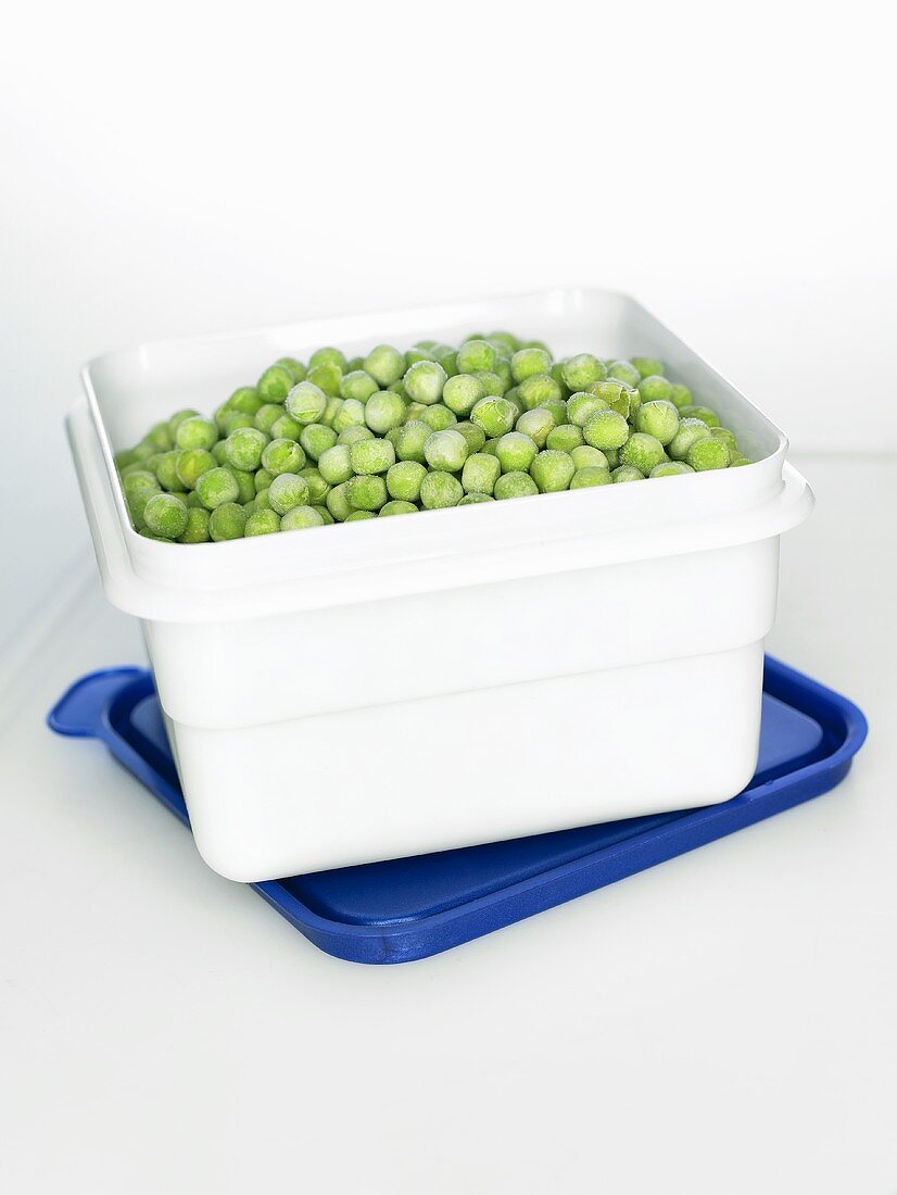 Frozen peas in a plastic box