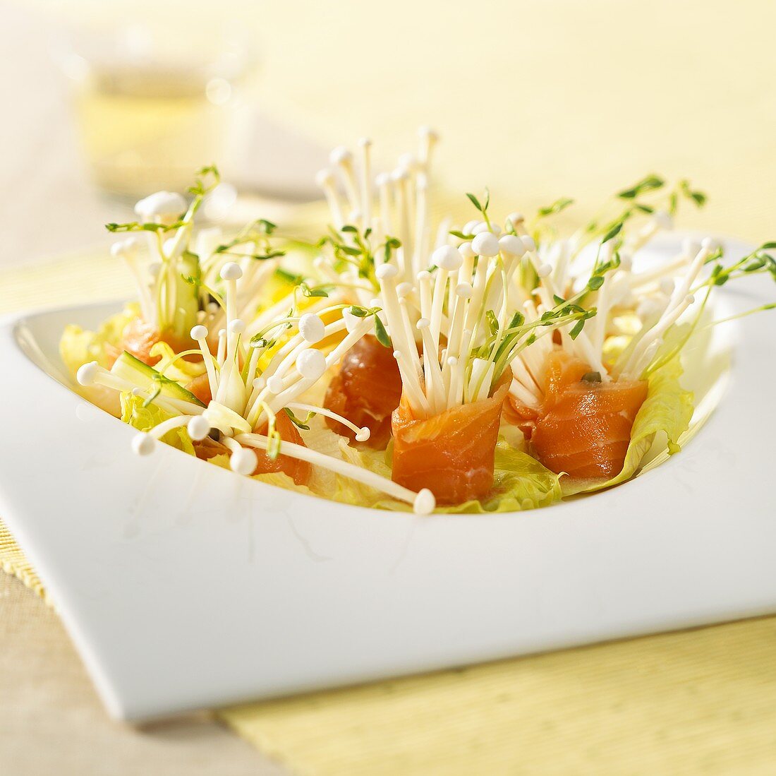 Salmon rolls with enoki mushrooms