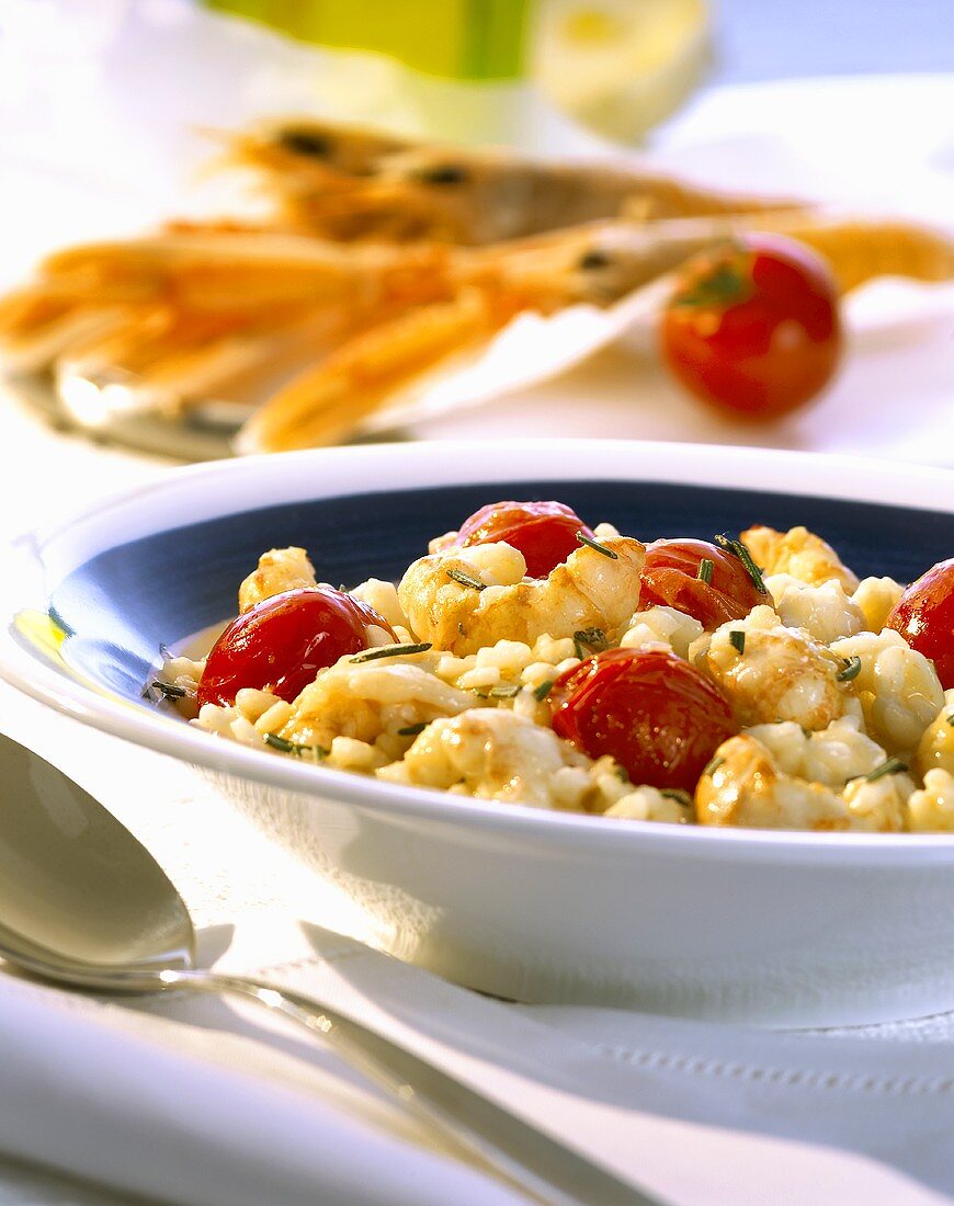 Risotto with scampi and cocktail tomatoes