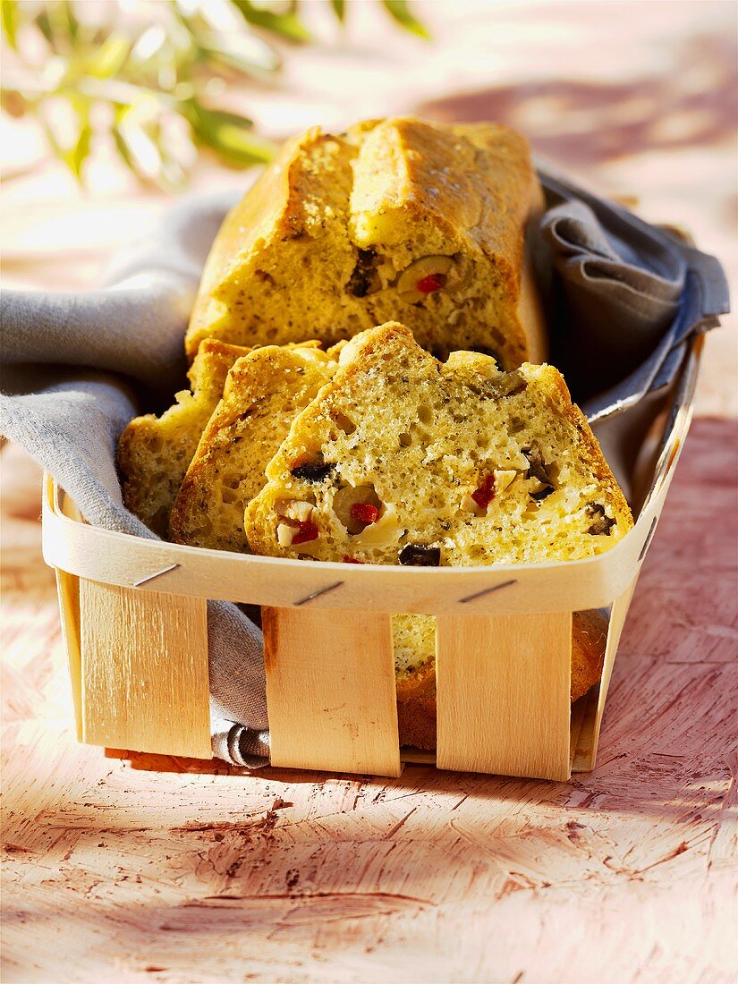 Olive bread in woodchip basket