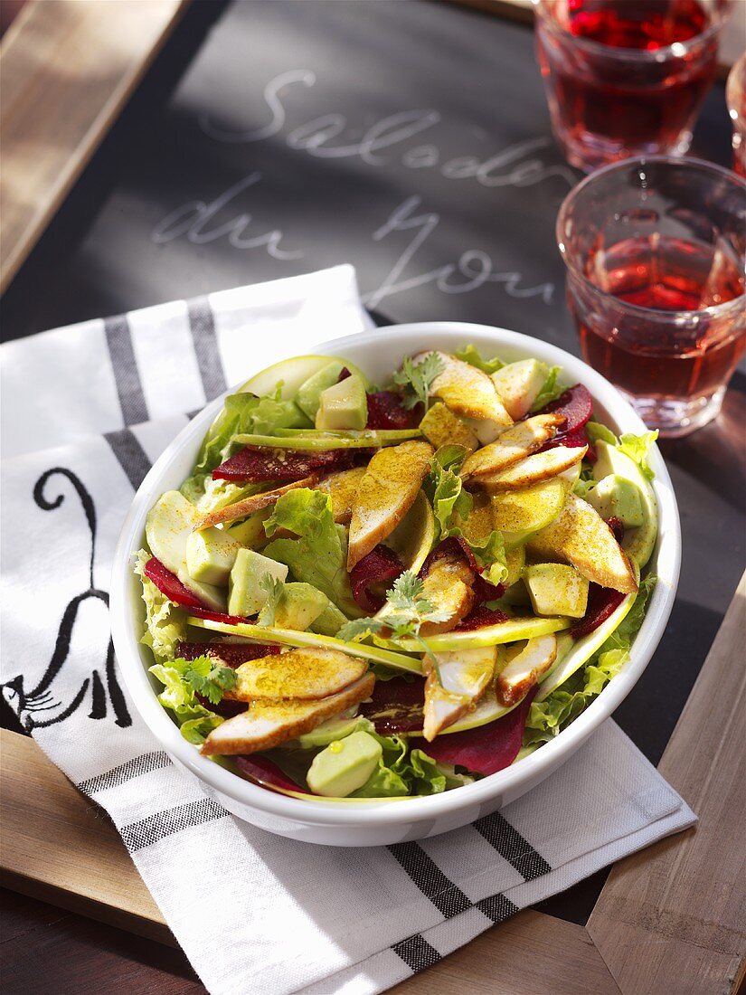 Salad leaves with chicken breast and avocado