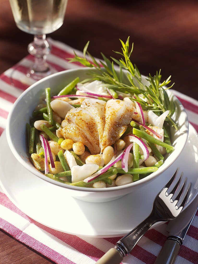 Bean salad with pieces of cod