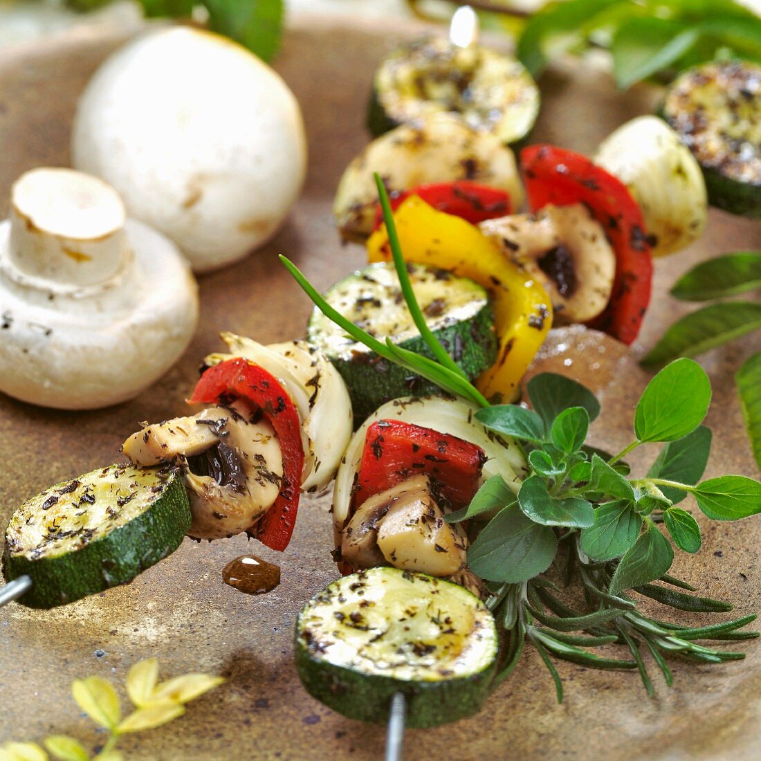 Grilled vegetable kebabs with mushrooms and herbs