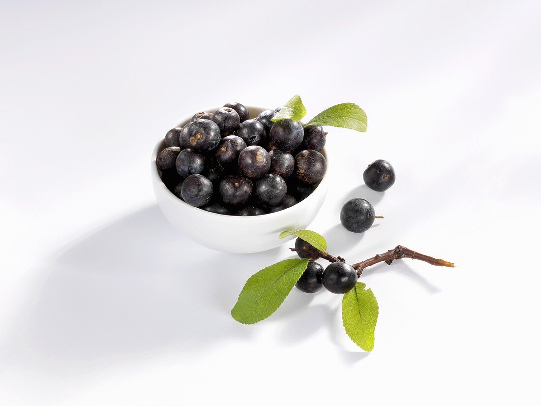 Sloes in a small bowl