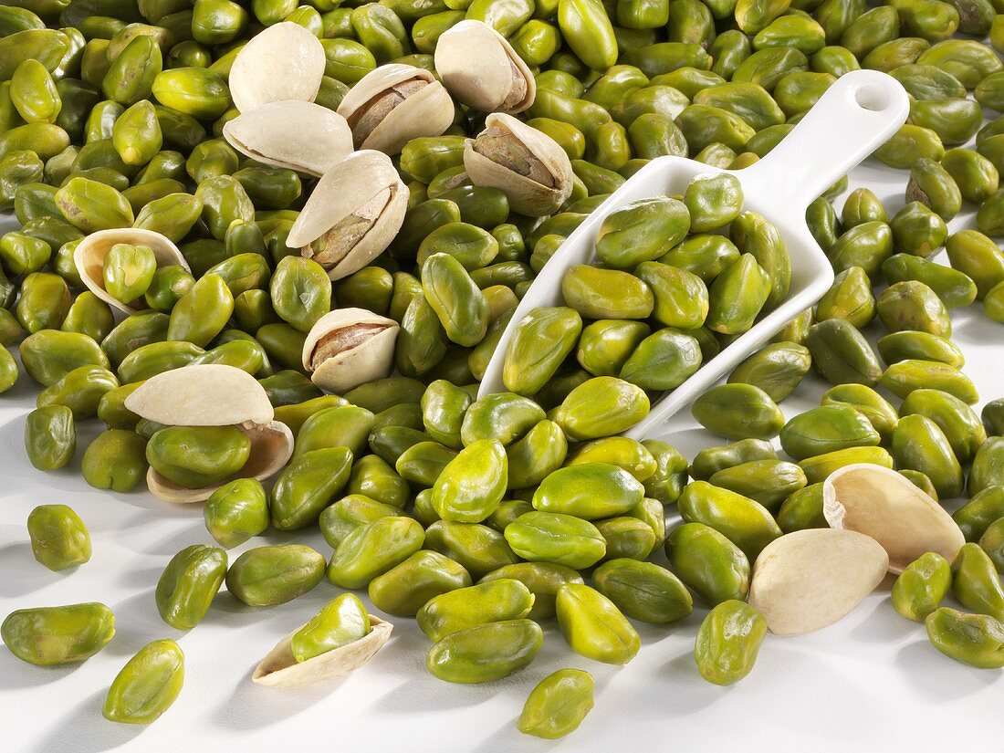 Shelled pistachios with scoop