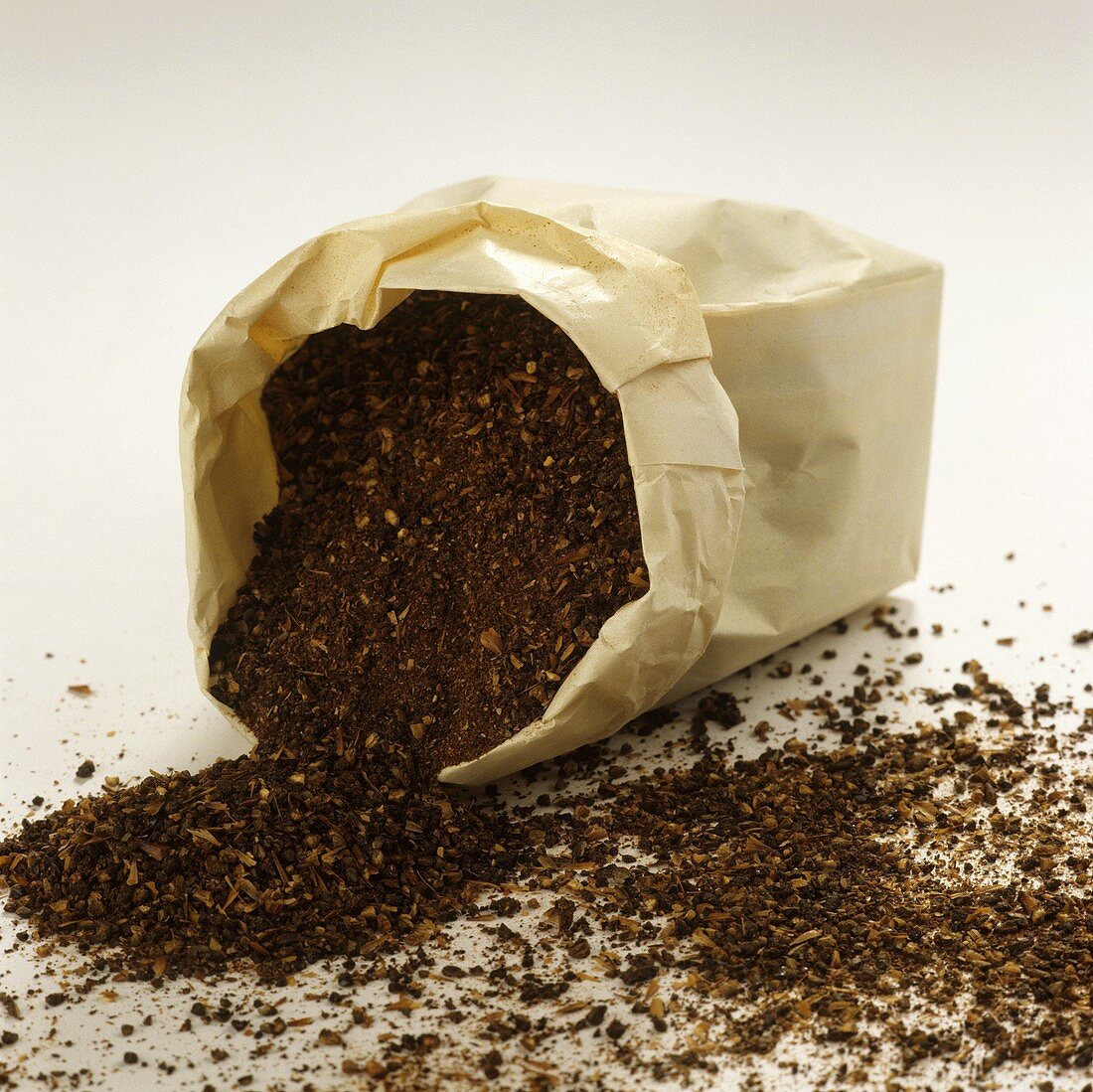Barley coffee falling out of a paper bag