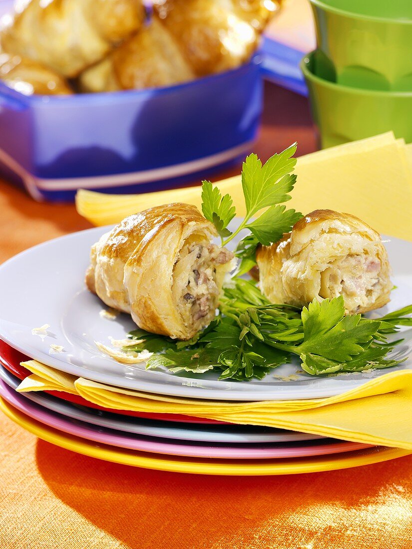 Puff pastry croissants with ham and mushroom filling