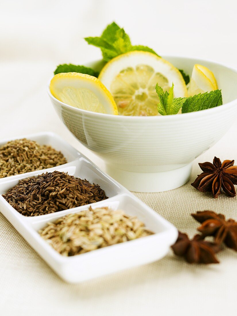 Herbs, spices and slices of lemon