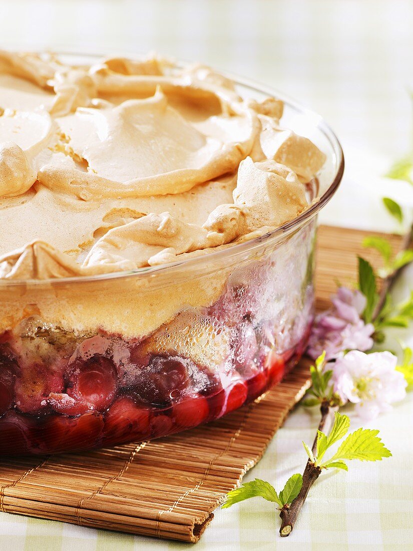 Cherry pudding with meringue topping