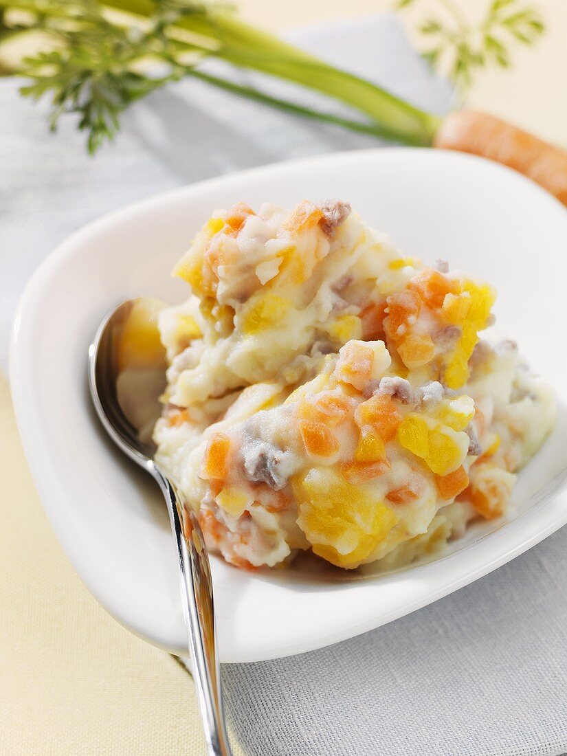 Mashed potato and vegetable dinner with minced lamb