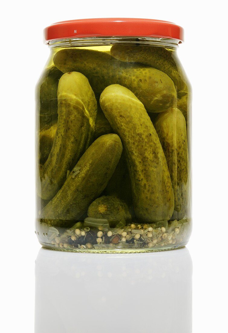 Pickled gherkins in a jar