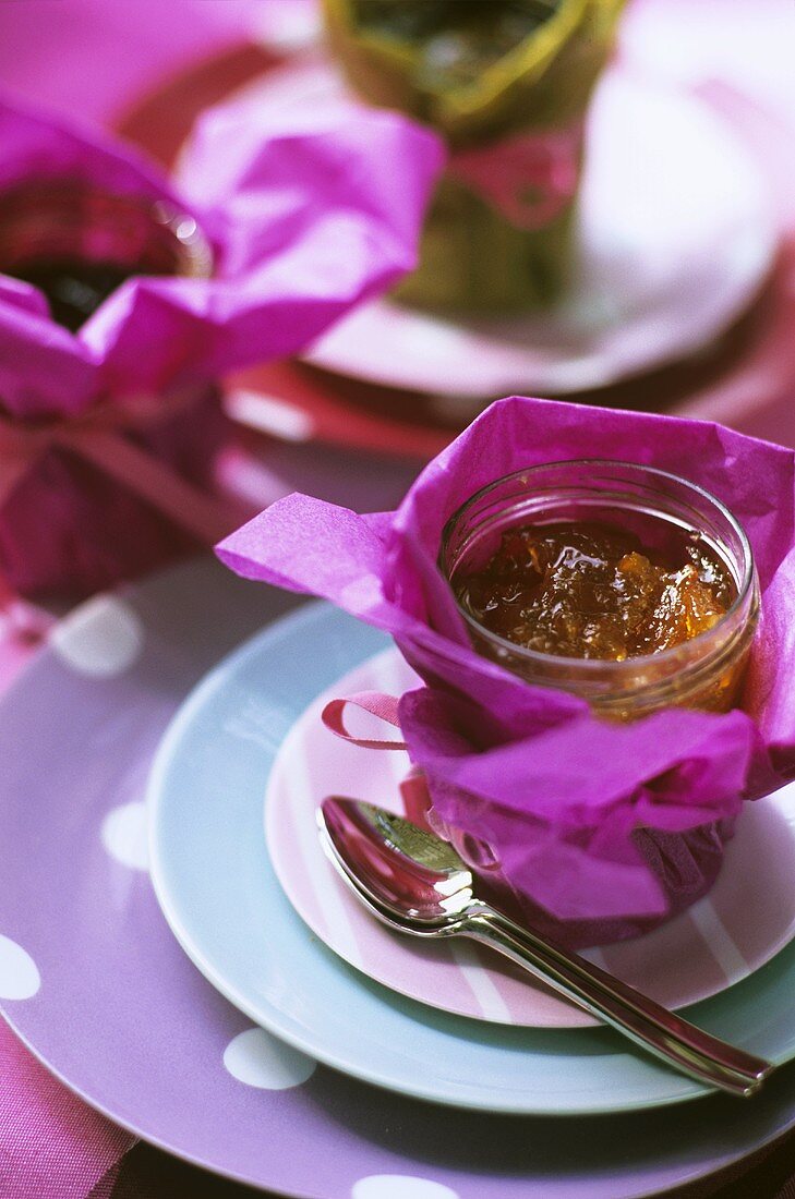 Marmalade in paper-wrapped jar