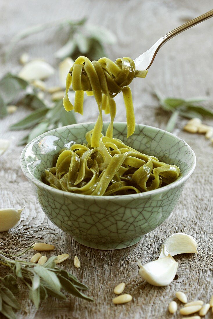Bowl of cooked spinach pasta