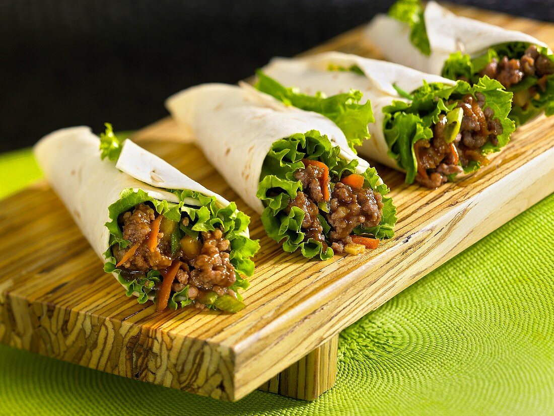Four wraps with mince and vegetable filling