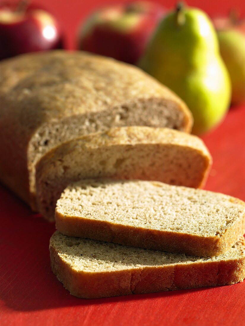 Wholemeal wheat and rye bread, partly sliced