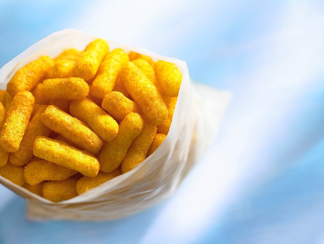 Cheesy corn puffs in a bag