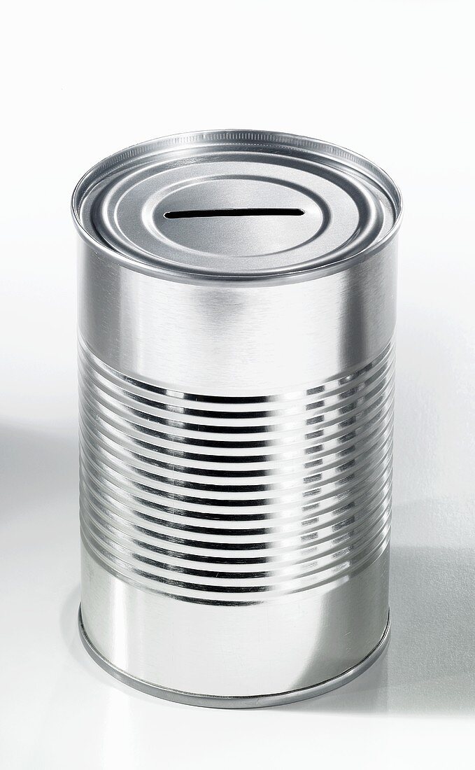 An empty food tin with a slit in the top