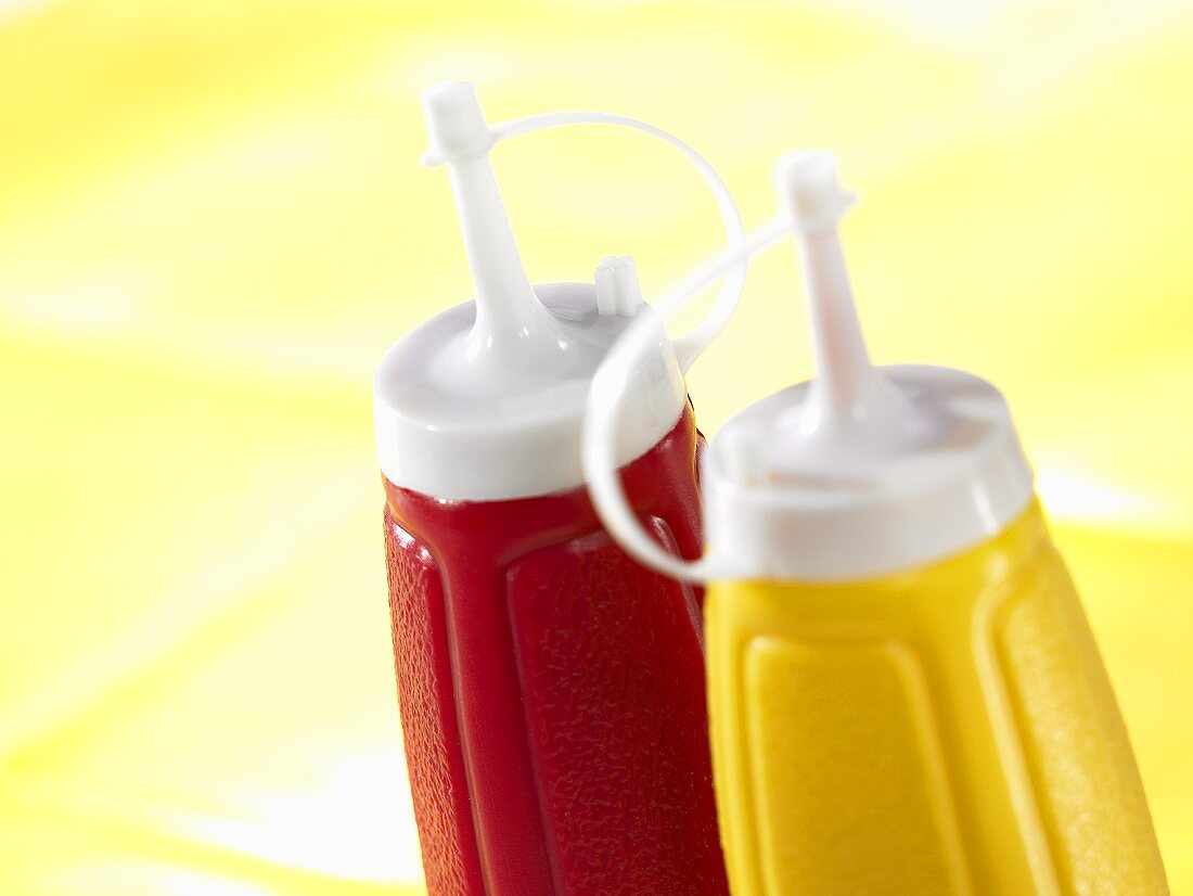 Ketchup and mustard in plastic bottles