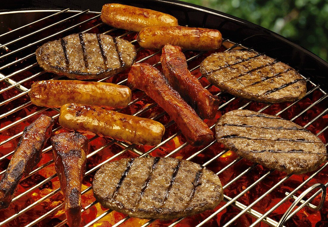 Meat and sausages on a barbecue