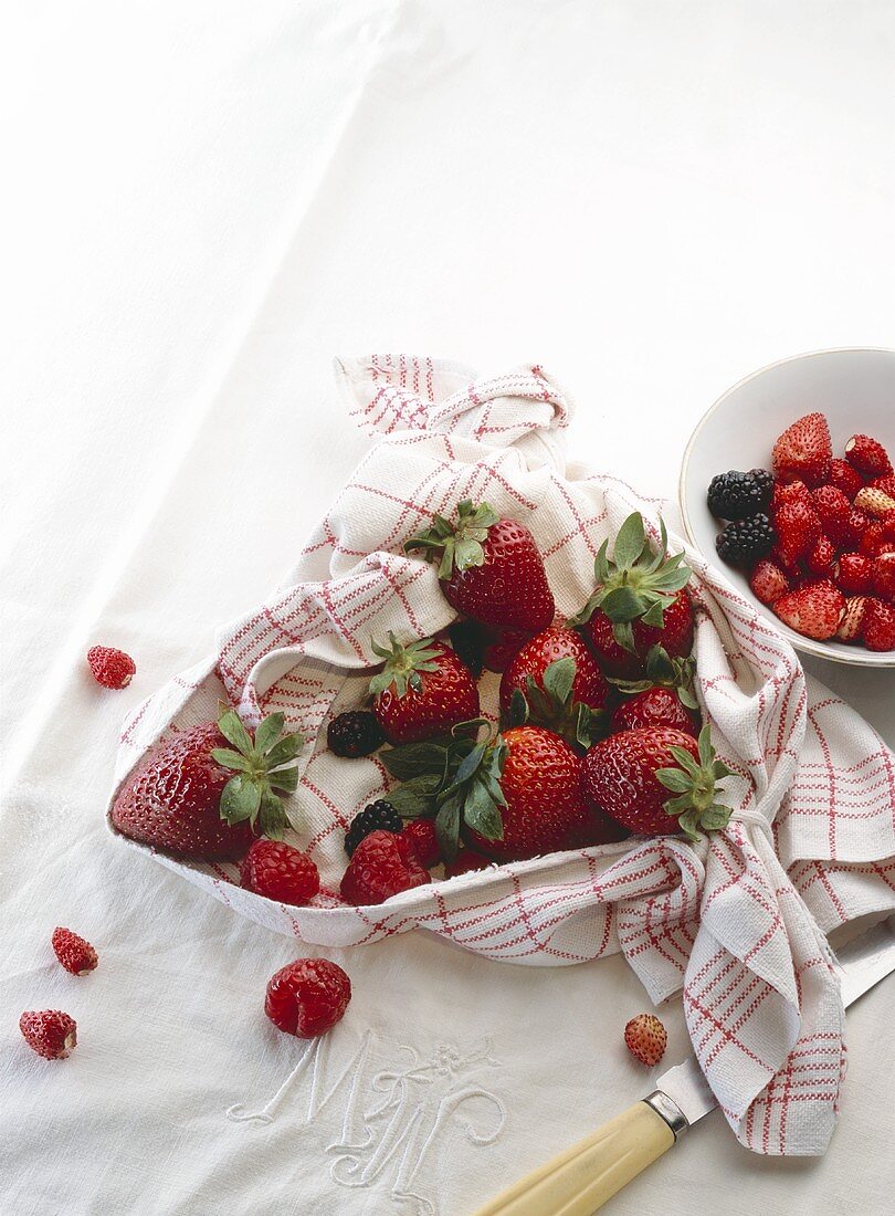 Fresh berries in a tea towel
